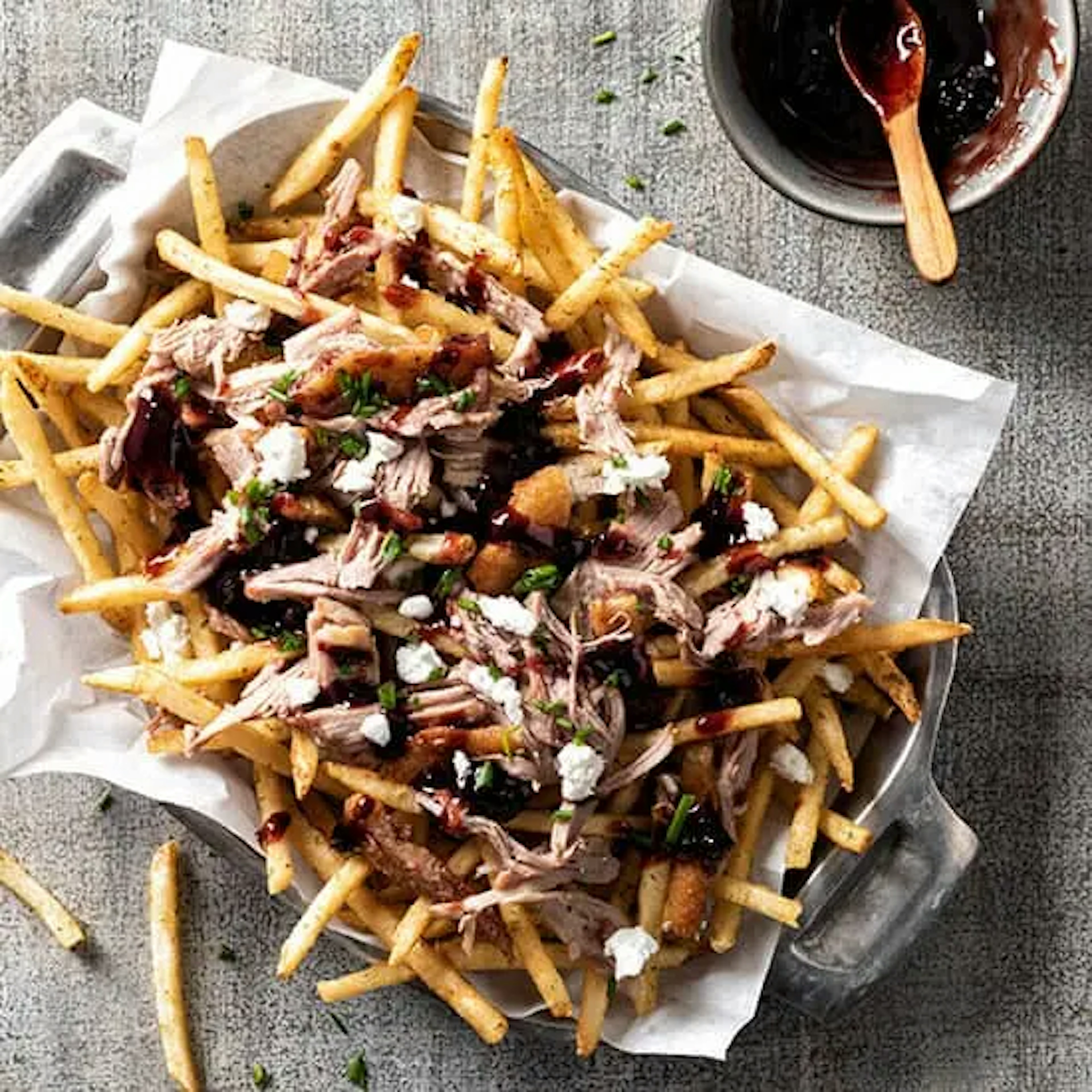 Duck Fat Fries with Duck Confit, Blackberry BBQ Sauce and Chevre